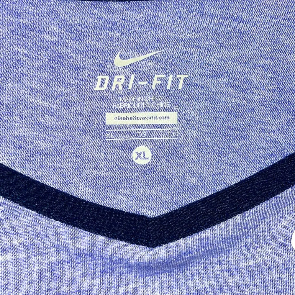 Nike short sleeved dri-fit women’s XL fits like a large. - Picture 8 of 9